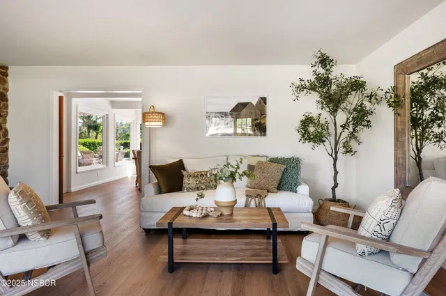 a dining room with furniture window wooden floor