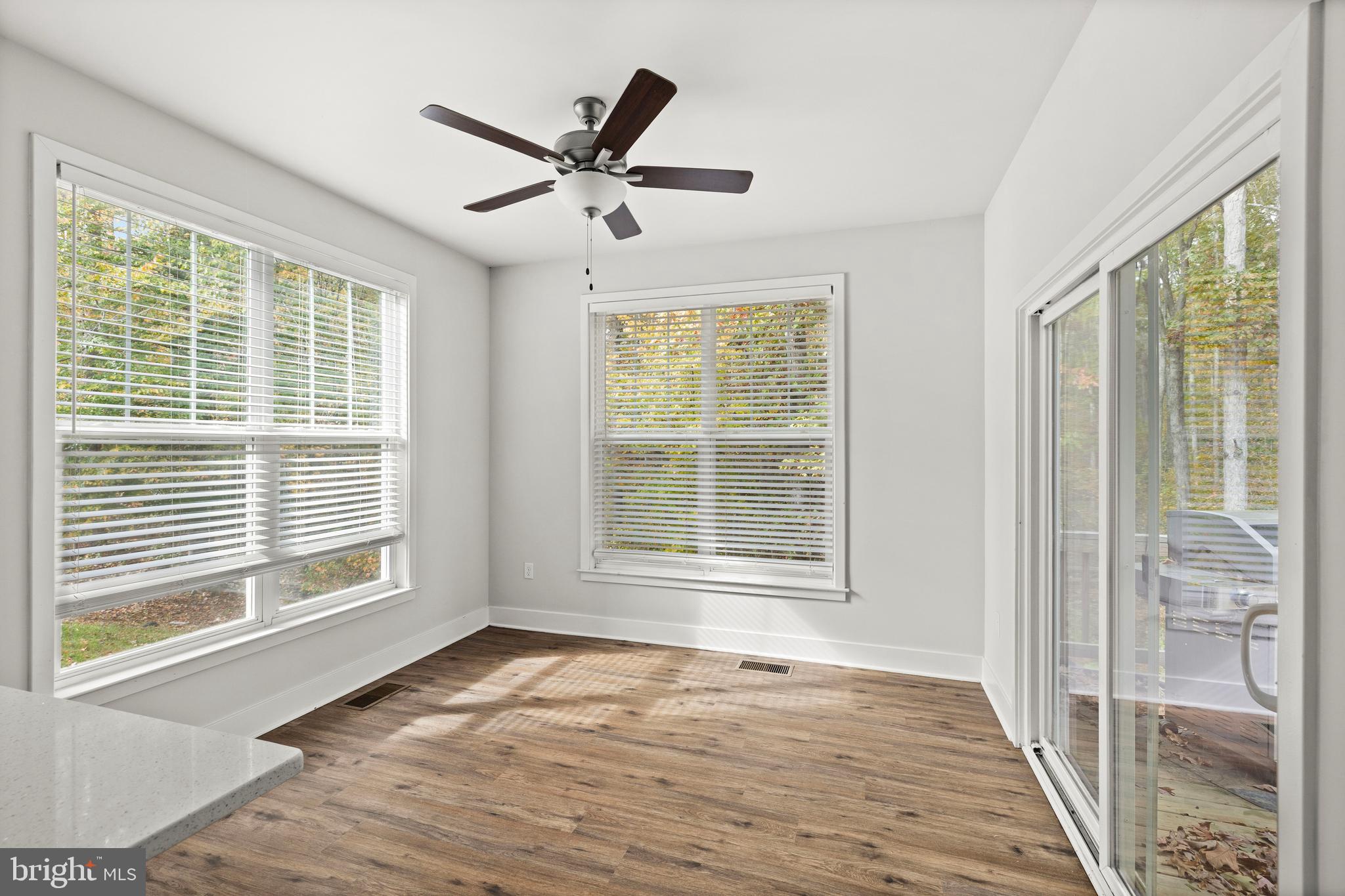 9113 Royal Court Partlow, VA 22534 - Photo 16 of 38 Sunroom off kitchen with deck