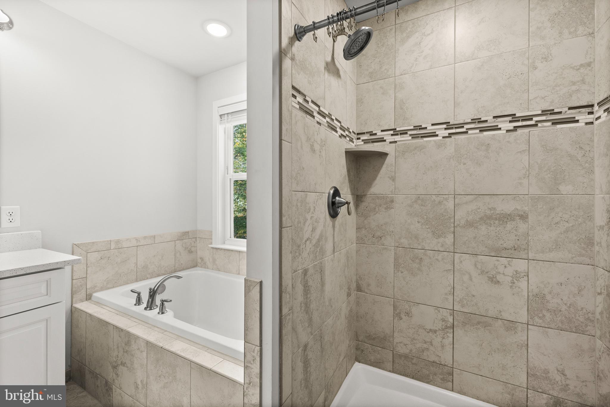 9113 Royal Court Partlow, VA 22534 - Photo 26 of 38 Walk in shower with upgraded tile.