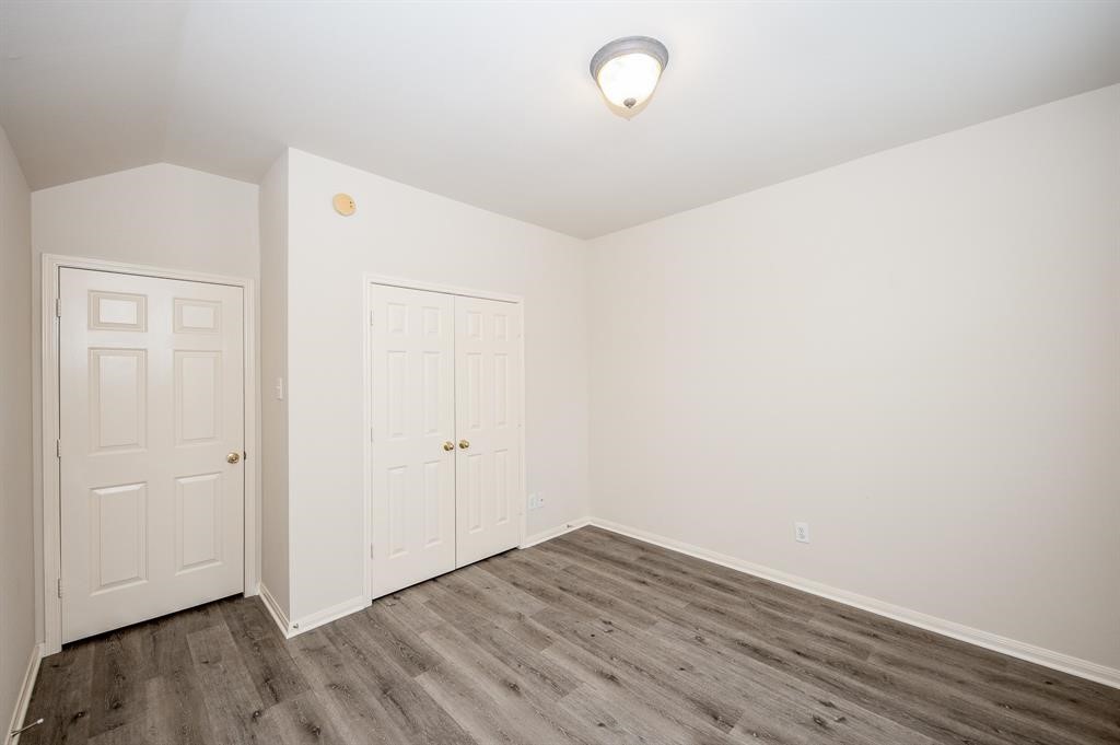 18914 Appletree Ridge Road Houston, TX 77084 - Photo 15 of 31 a view of a room with wooden floor