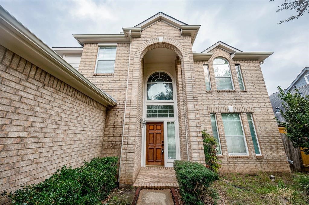 18914 Appletree Ridge Road Houston, TX 77084 - Photo 29 of 31 a view of a brick house with potted plants