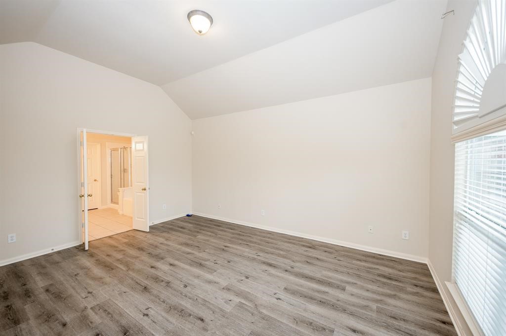 18914 Appletree Ridge Road Houston, TX 77084 - Photo 10 of 31 a view of an empty room and window