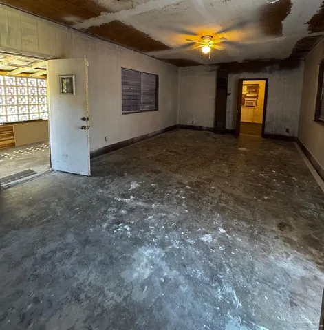 an empty room with windows