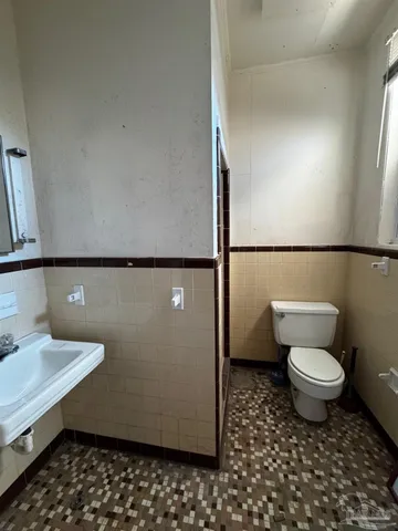 a bathroom with a sink and a toilet