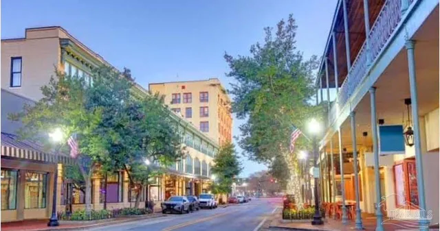 an aerial view of a house with outdoor space