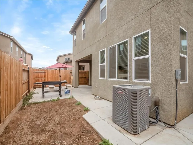 a house with a bench in front of it