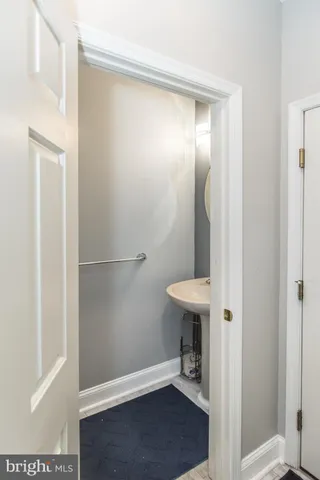 a bathroom with a toilet and a sink