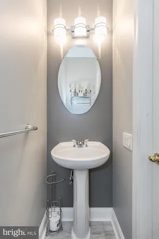 a kitchen with stainless steel appliances granite countertop a sink dishwasher stove and refrigerator