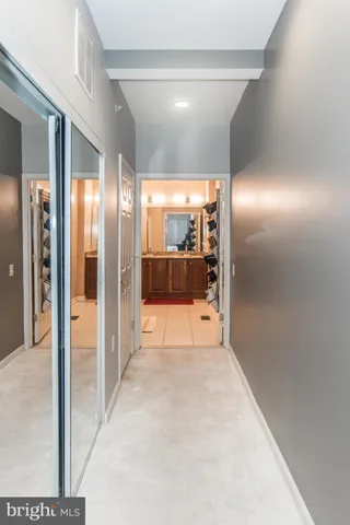 a bathroom with a glass shower door