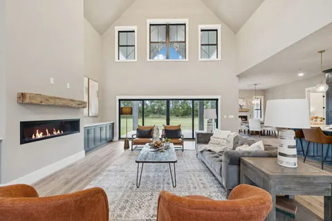 a kitchen with a table and chairs in it