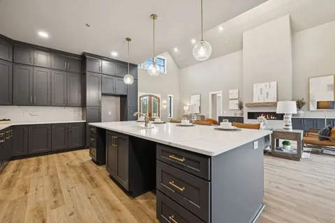 a bedroom with a large bed and a couch