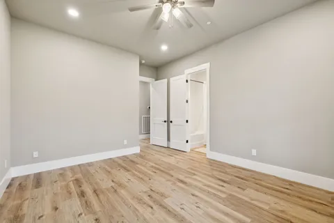 a view of a house with backyard and a garden