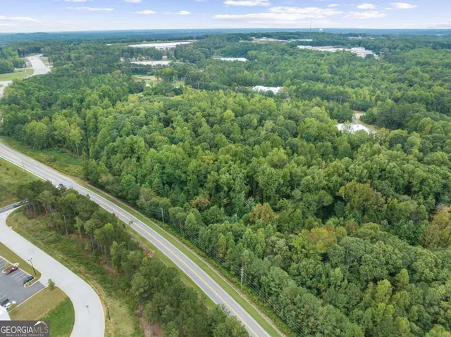 a view of swimming pool with a yard
