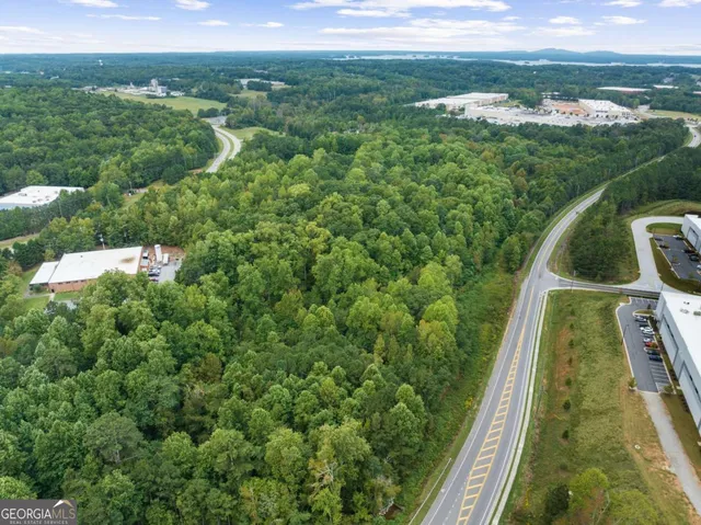 a view of a lake with a yard