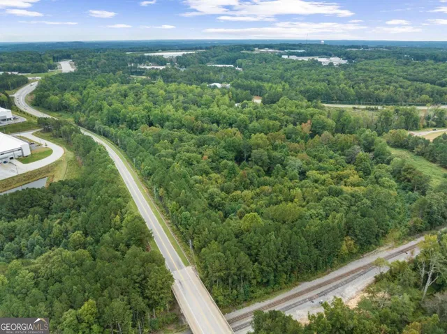 a view of a forest from a balcony