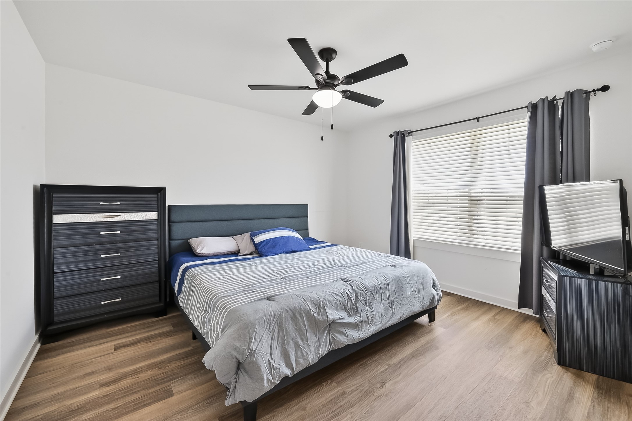 4320 Rustling Aspen Drive Rosenberg, TX 77469 - Photo 14 of 49 Secondary bedroom #2 featuring a walk-in closet for added storage