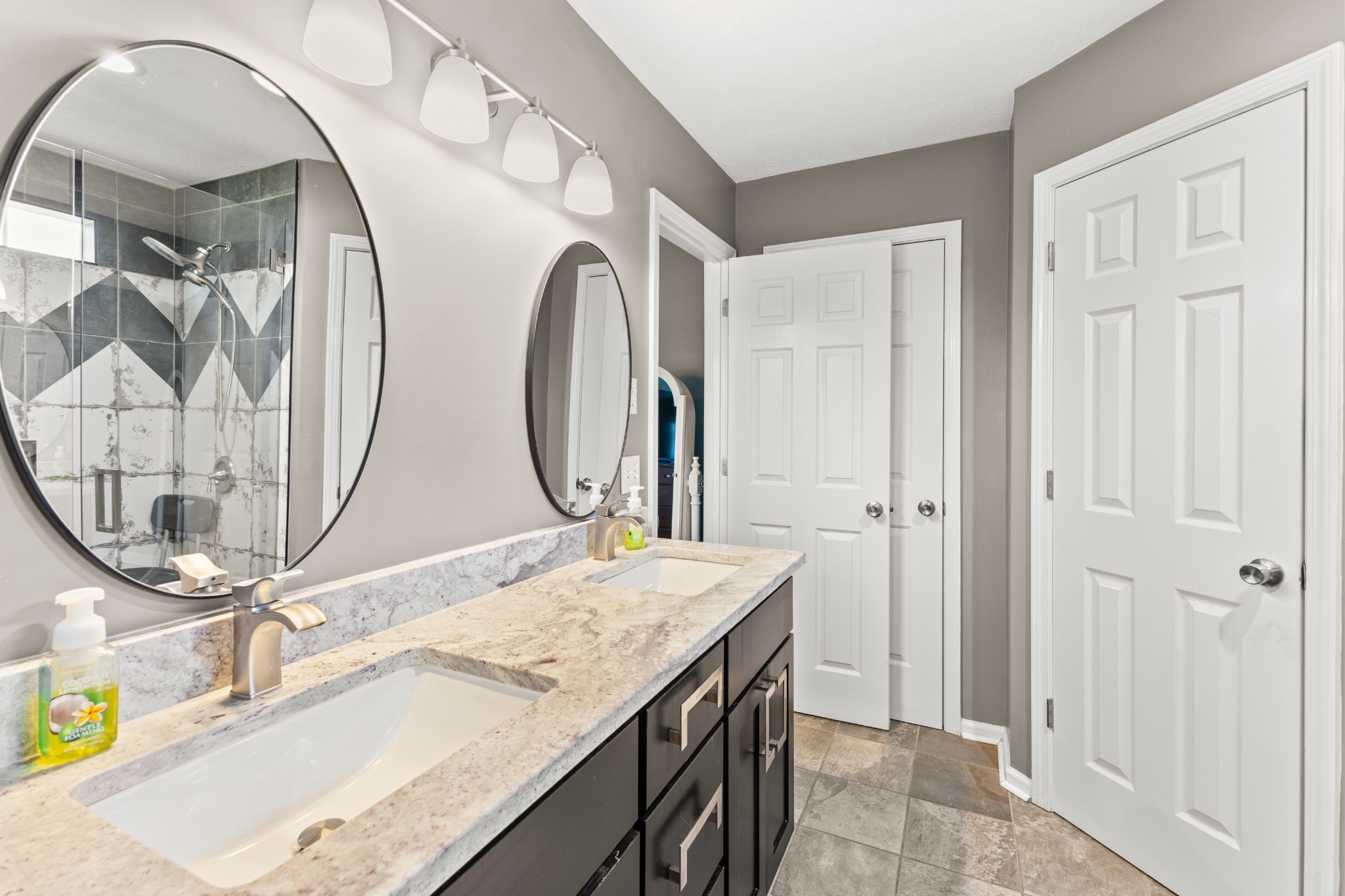1010 Jacob's Valley Road Joelton, TN 37080 - Photo 12 of 33 a bathroom with a granite countertop sink and a mirror