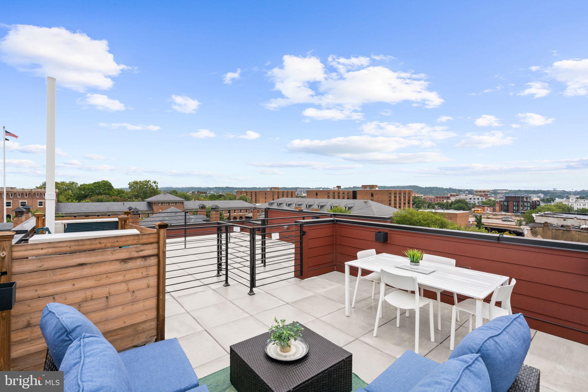 733 8th Street Southeast, Unit 303 Washington, DC 20003 - Photo 17 of 18 a view of a terrace with furniture