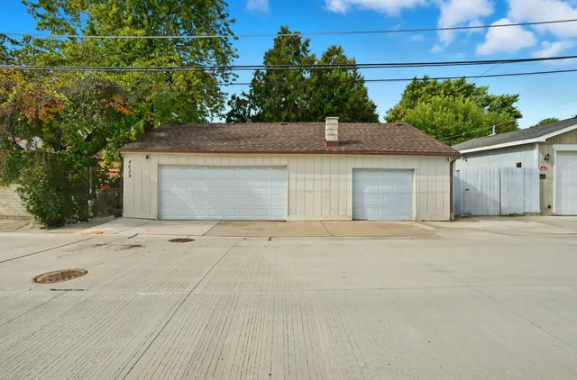 a front view of a house with a garage