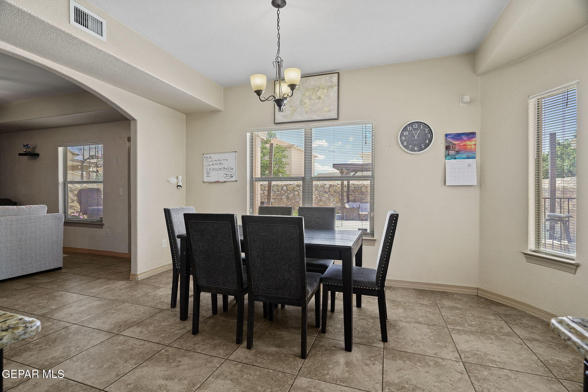 3152 Rustic Hidden Drive El Paso, TX 79938 - Photo 13 of 38 a view of a dining room with furniture