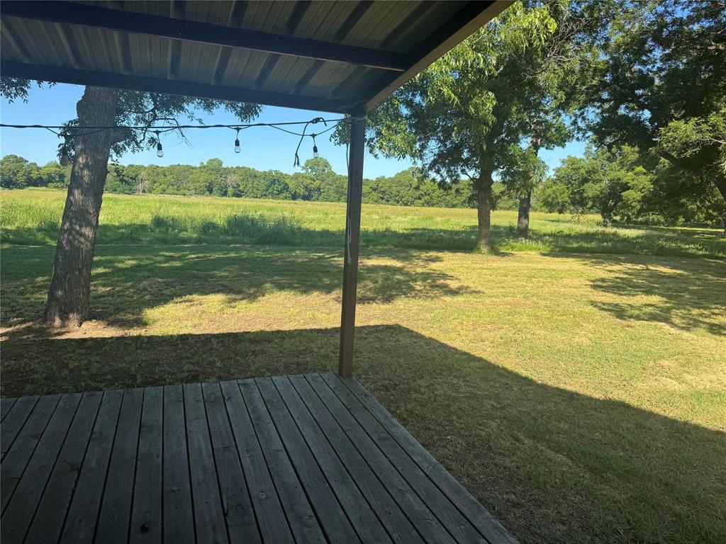 377 Private Road 3249, Unit ARENA Decatur, TX 76234 - Photo 35 of 40 a view of an ocean from a balcony