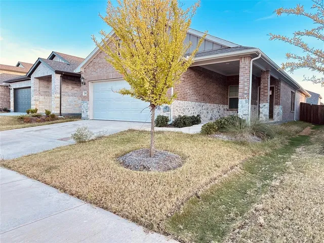 a view of a house with a street
