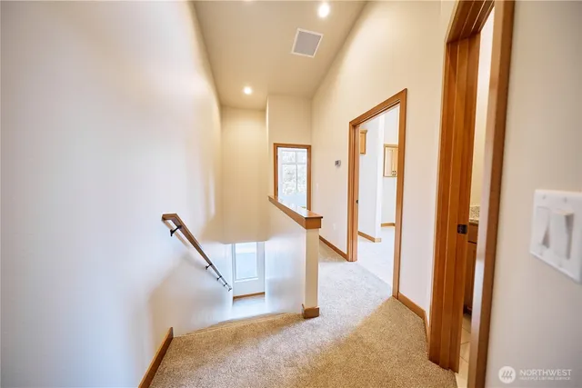 a kitchen with stainless steel appliances granite countertop a refrigerator stove microwave and sink