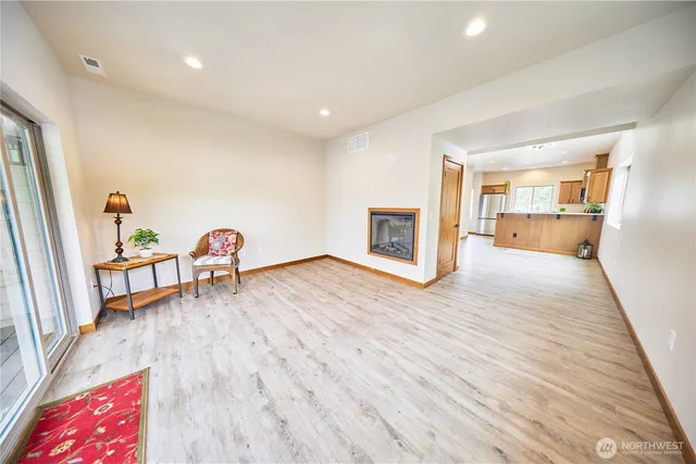 a balcony with wooden floor