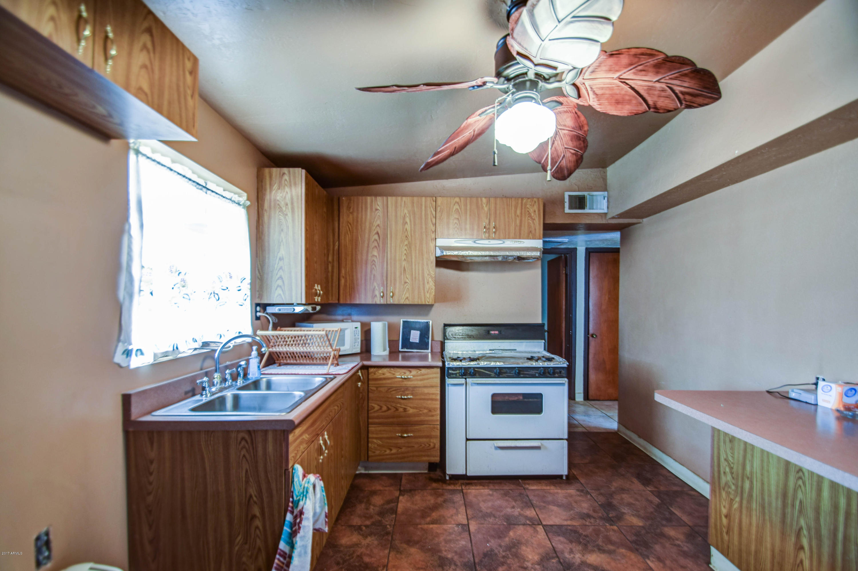 1644 West Chipman Road Phoenix, AZ 85041 - Photo 7 of 24 kitchen 2
