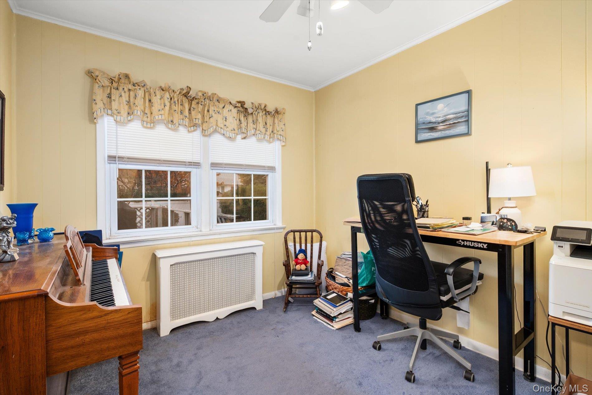 2271 Locust Street Merrick, NY 11566 - Photo 11 of 24 a view of a workspace with furniture and a window