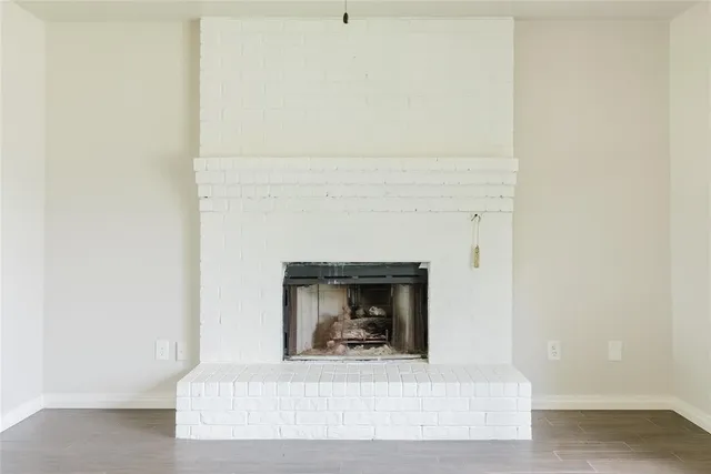 a living room with a fireplace
