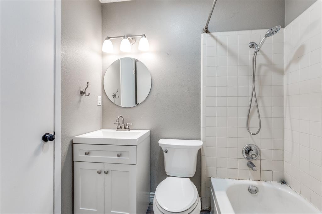 500 Lake Crest Parkway Azle, TX 76020 - Photo 14 of 23 a bathroom with a toilet sink and shower