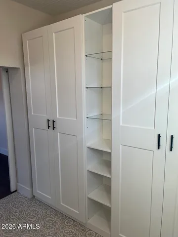 a view of a walk in closet