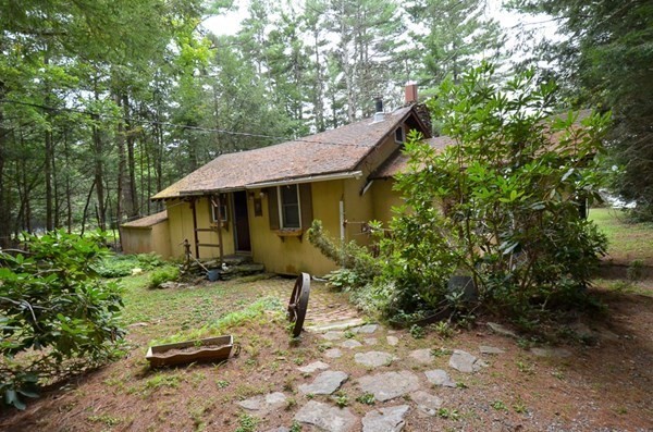 23 Pine Acres Road Spencer, MA 01562 - Photo 1 of 15 a house with trees in the background