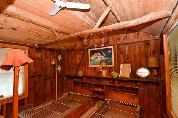 23 Pine Acres Road Spencer, MA 01562 - Photo 12 of 15 a room with wooden walls