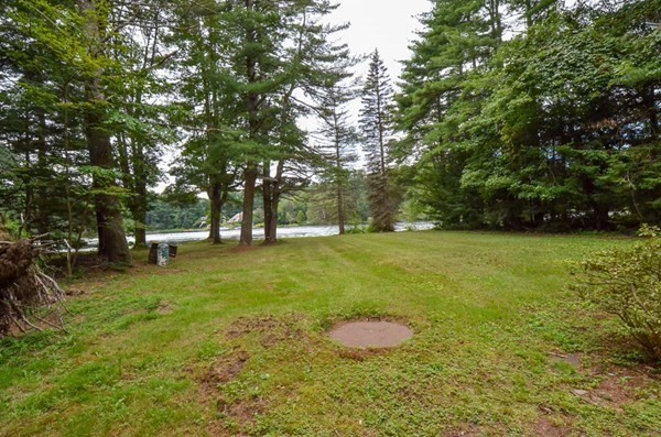23 Pine Acres Road Spencer, MA 01562 - Photo 5 of 15 a view of a trees with a yard
