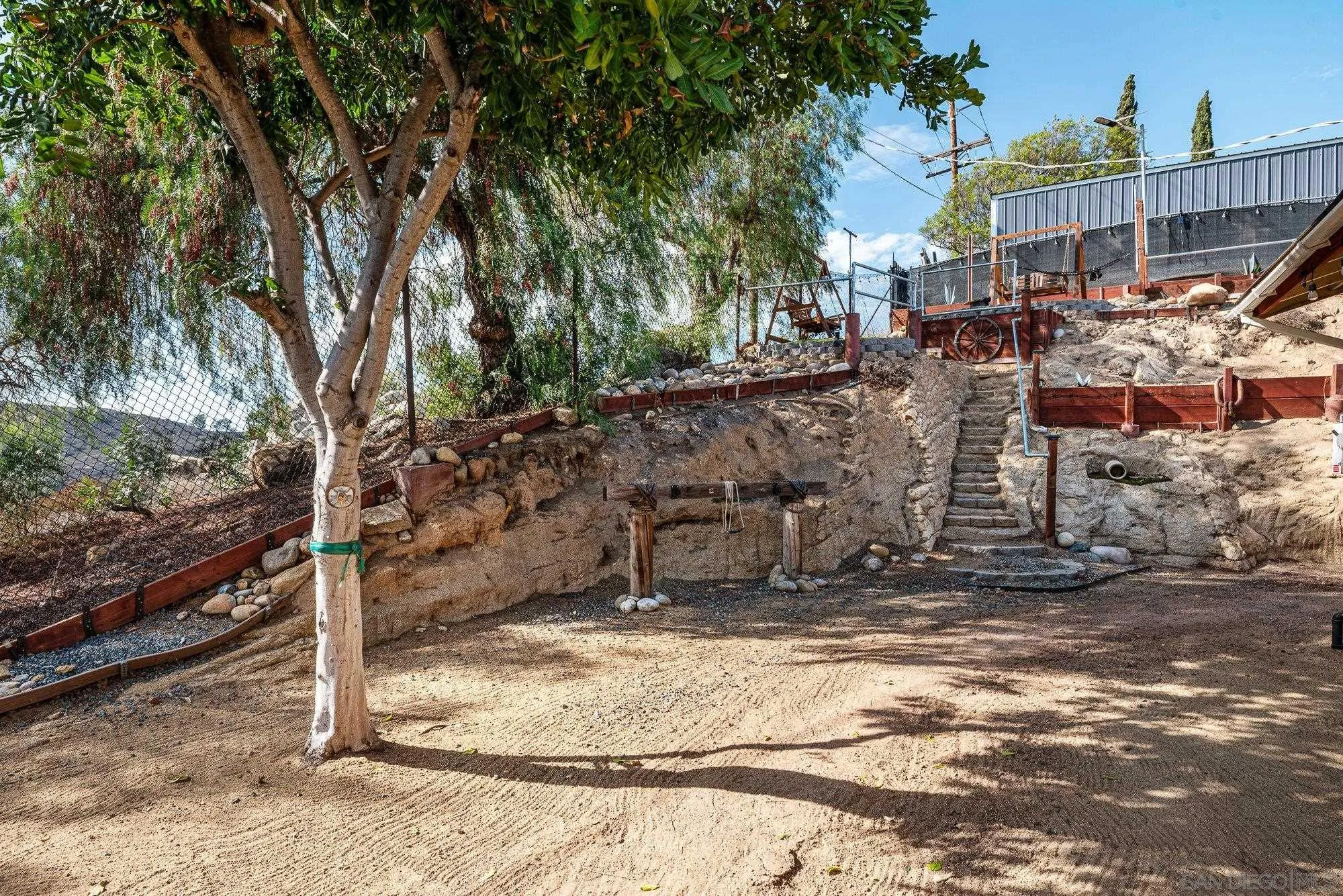 8944 Bower Lane Lakeside, CA 92040 - Photo 29 of 40 a view of street with large tree