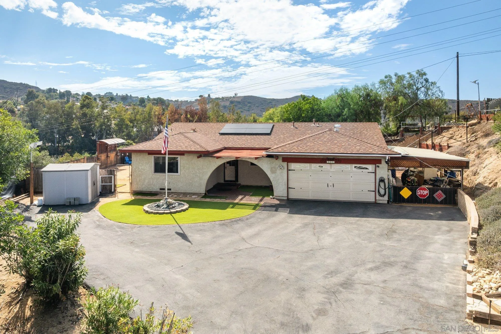 8944 Bower Lane Lakeside, CA 92040 - Photo 6 of 40 an aerial view of a house with swimming pool and furniture