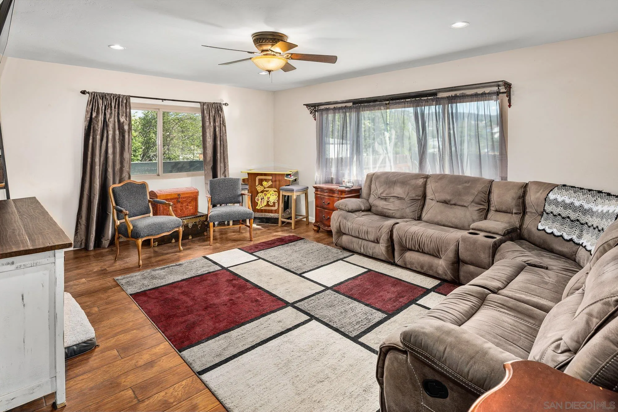8944 Bower Lane Lakeside, CA 92040 - Photo 10 of 40 a living room with furniture and a large window