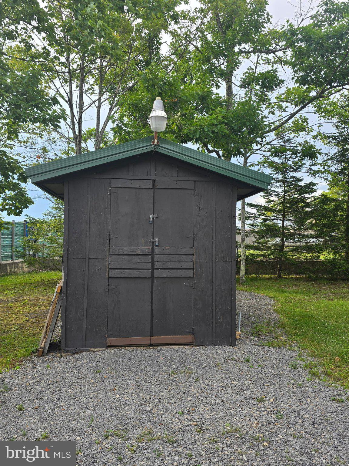 700 Paul Stahl Road Mount Storm, WV 26739 - Photo 26 of 31 Charming shed nestled in greenery.