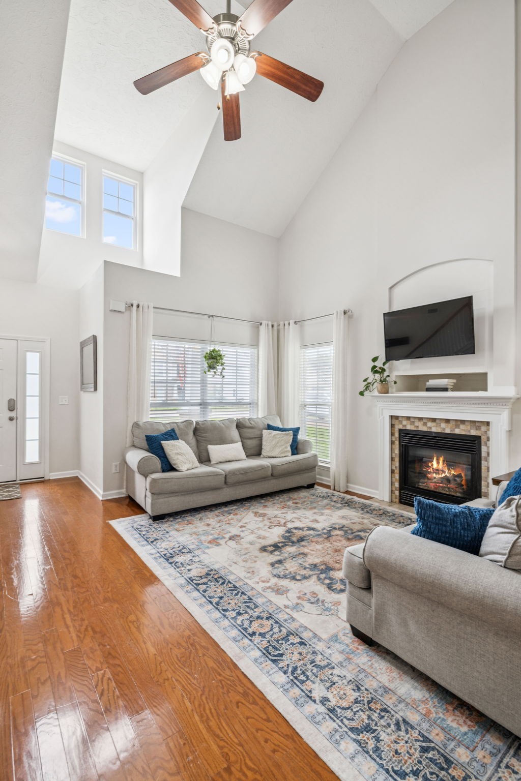 1443 Bern Drive Spring Hill, TN 37174 - Photo 14 of 64 a living room with furniture and a fireplace