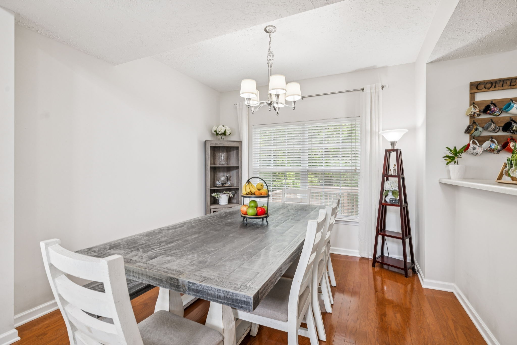 1443 Bern Drive Spring Hill, TN 37174 - Photo 20 of 64 a view of a dining room with furniture wooden floor and a chandelier