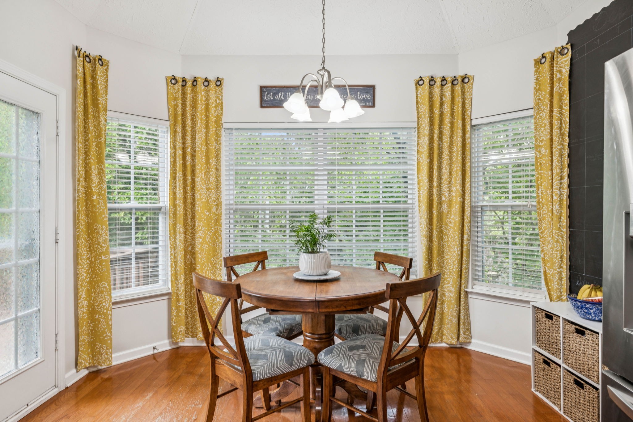 1443 Bern Drive Spring Hill, TN 37174 - Photo 26 of 64 a view of a dining room with furniture window and wooden floor