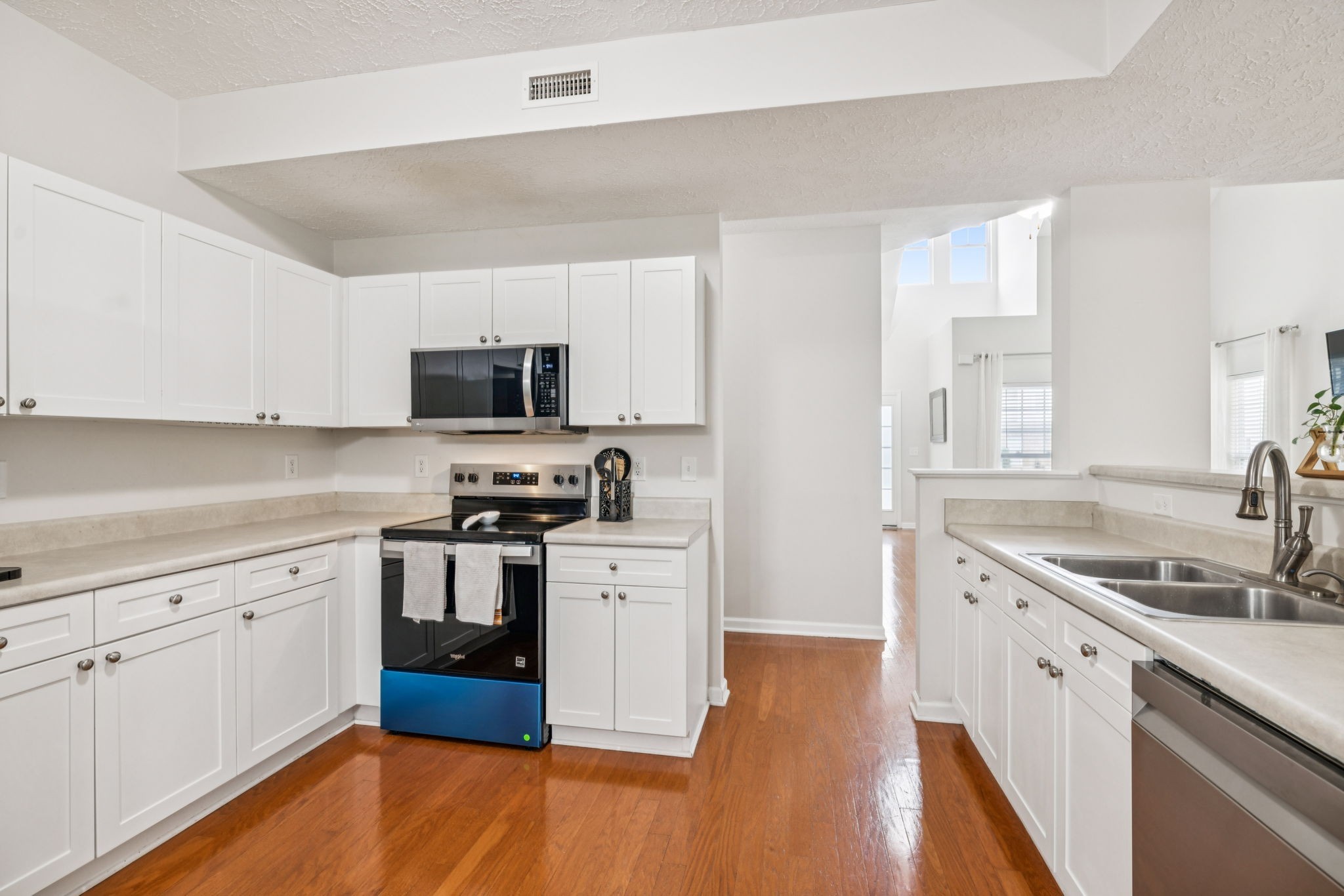 1443 Bern Drive Spring Hill, TN 37174 - Photo 28 of 64 a kitchen with stainless steel appliances granite countertop a sink stove and refrigerator