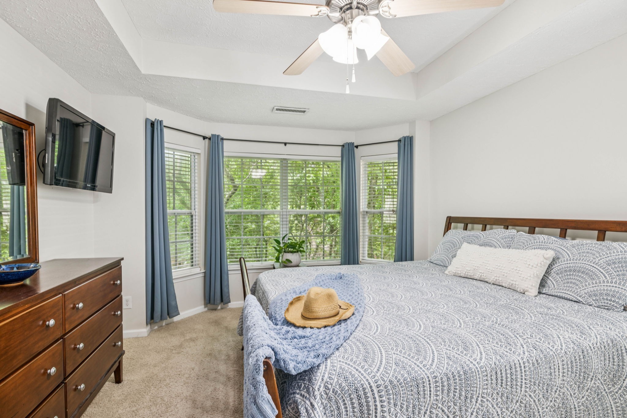 1443 Bern Drive Spring Hill, TN 37174 - Photo 33 of 64 a bedroom with a bed and a chandelier