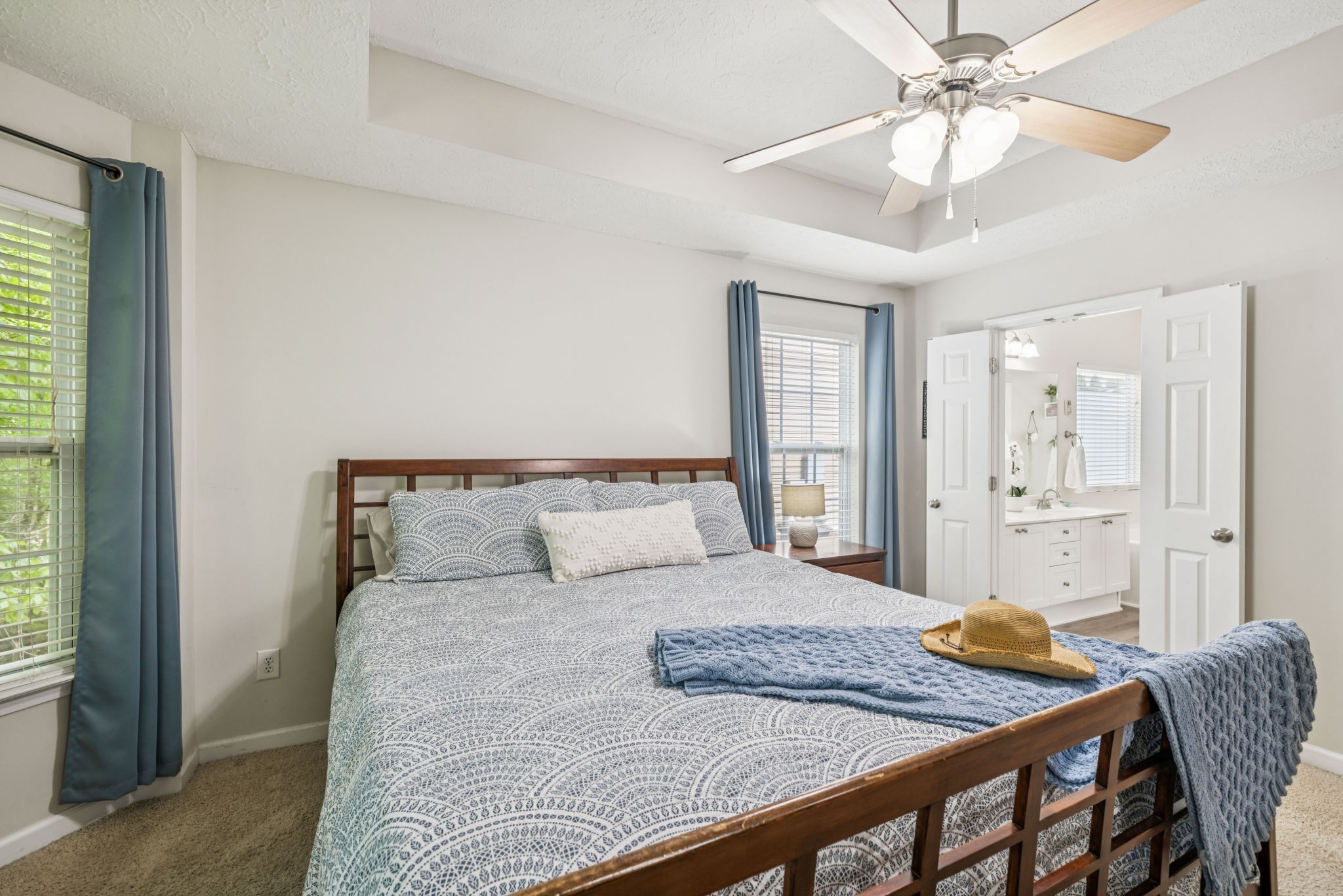 1443 Bern Drive Spring Hill, TN 37174 - Photo 35 of 64 a bedroom with a bed and a chandelier