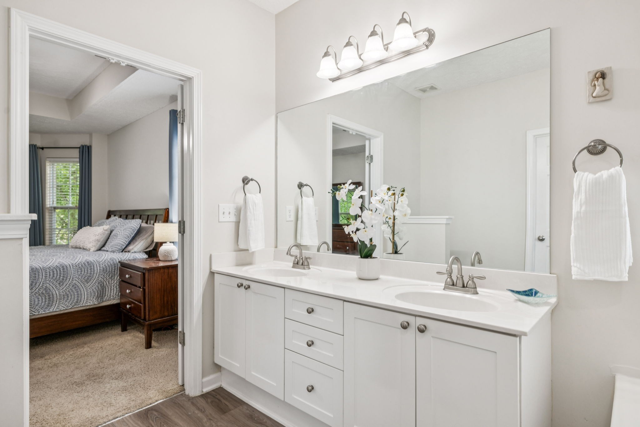 1443 Bern Drive Spring Hill, TN 37174 - Photo 38 of 64 a bathroom with a double vanity sink and a mirror