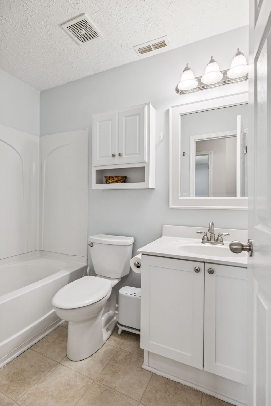 1443 Bern Drive Spring Hill, TN 37174 - Photo 46 of 64 a bathroom with a toilet sink and mirror