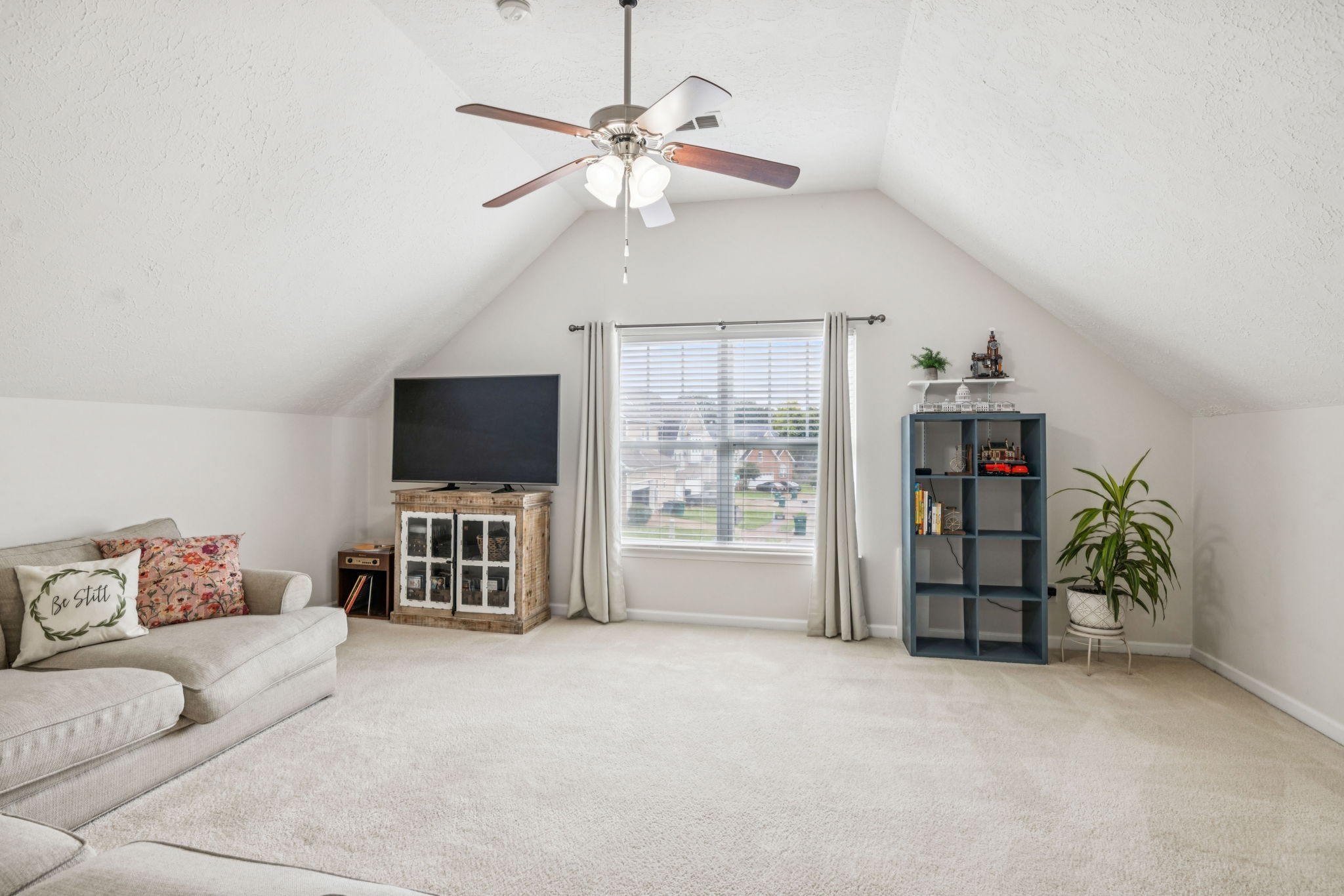 1443 Bern Drive Spring Hill, TN 37174 - Photo 48 of 64 a living room with furniture and a flat screen tv