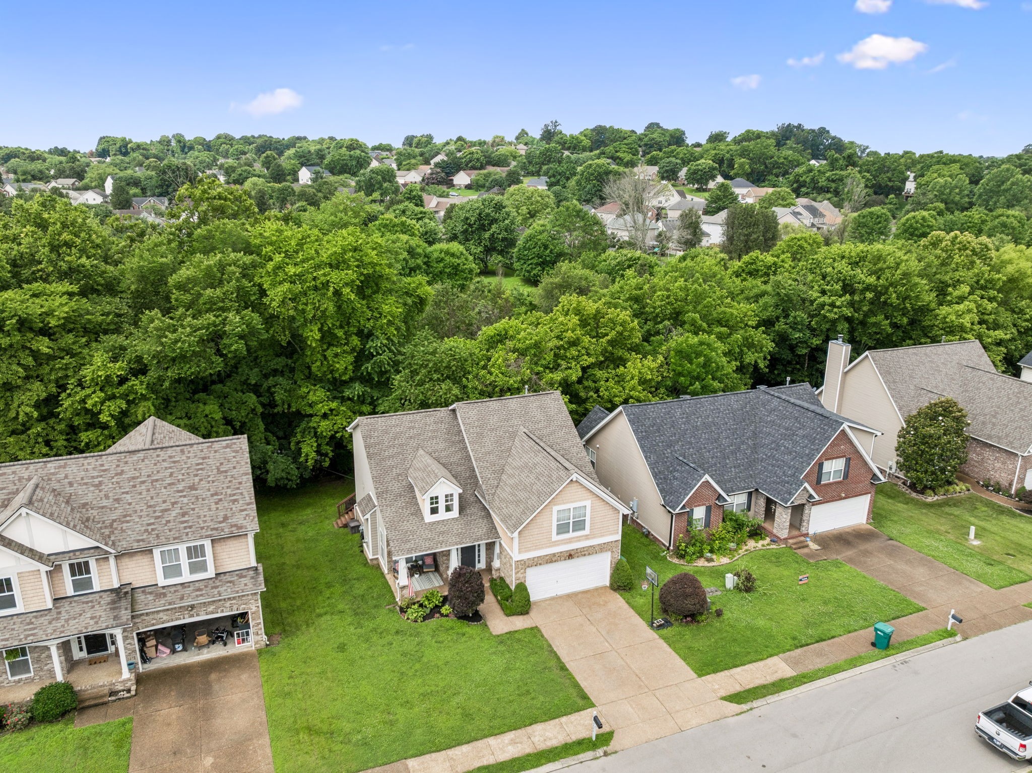 1443 Bern Drive Spring Hill, TN 37174 - Photo 61 of 64 an aerial view of a house with garden space and street view